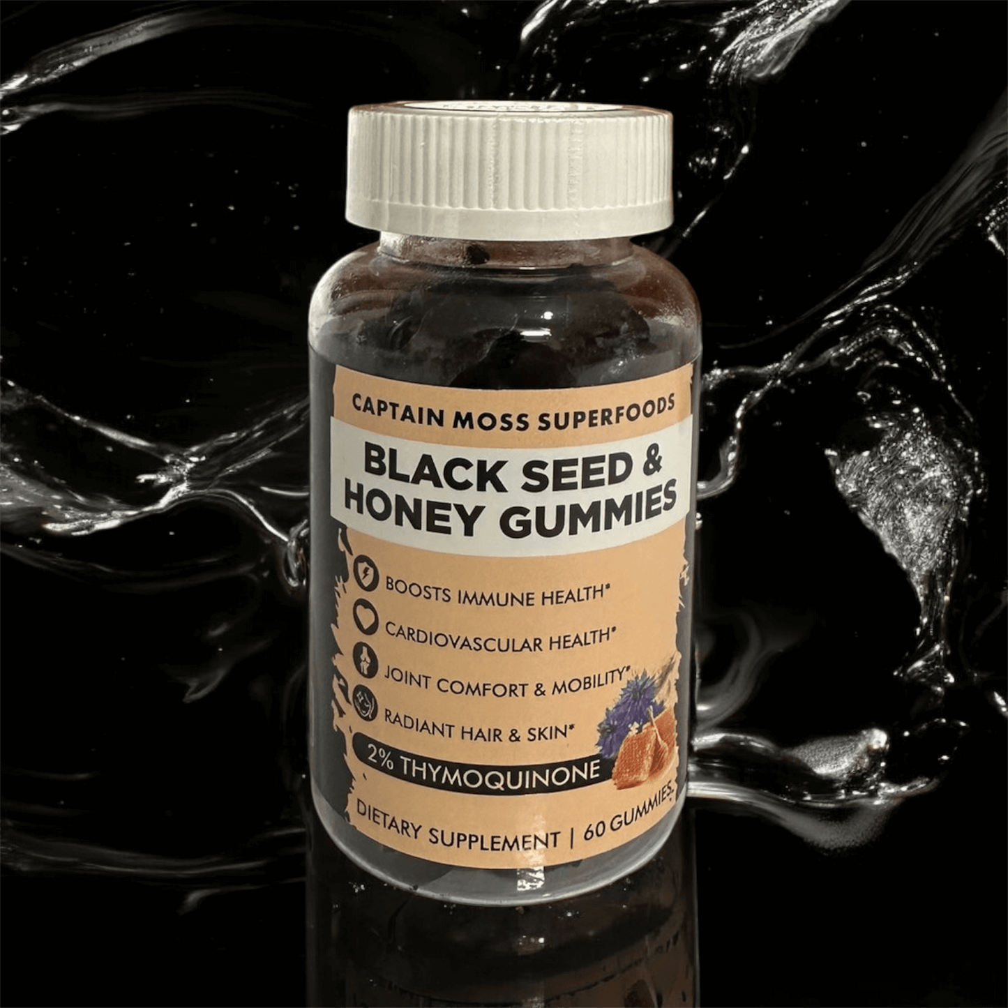 Premium Black Seed & Honey Gummies by Captain Moss, 60 vegan dietary supplements in a clear bottle with health benefits listed.